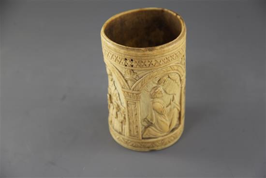 A carved ivory situla, late 19th century in Medieval style, height 6.5in.